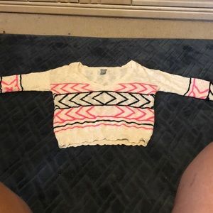 Cream sweater with pink and black design